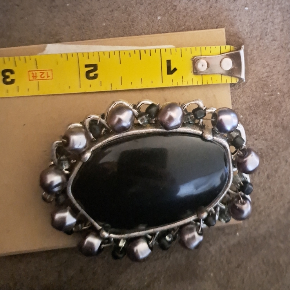 Peyote Bird unusual collar pin of unknown material.